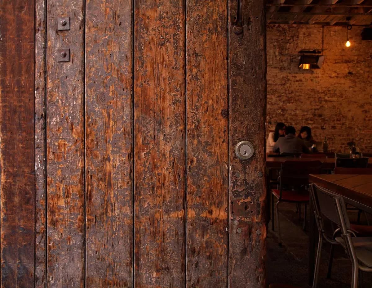 Krimper Cafe atmospheric interior — rustic industrial heritage space